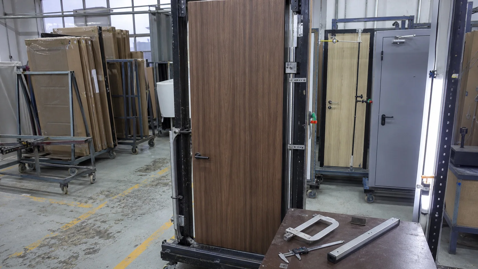 Finished interior door undergoing dimensional and visual inspection